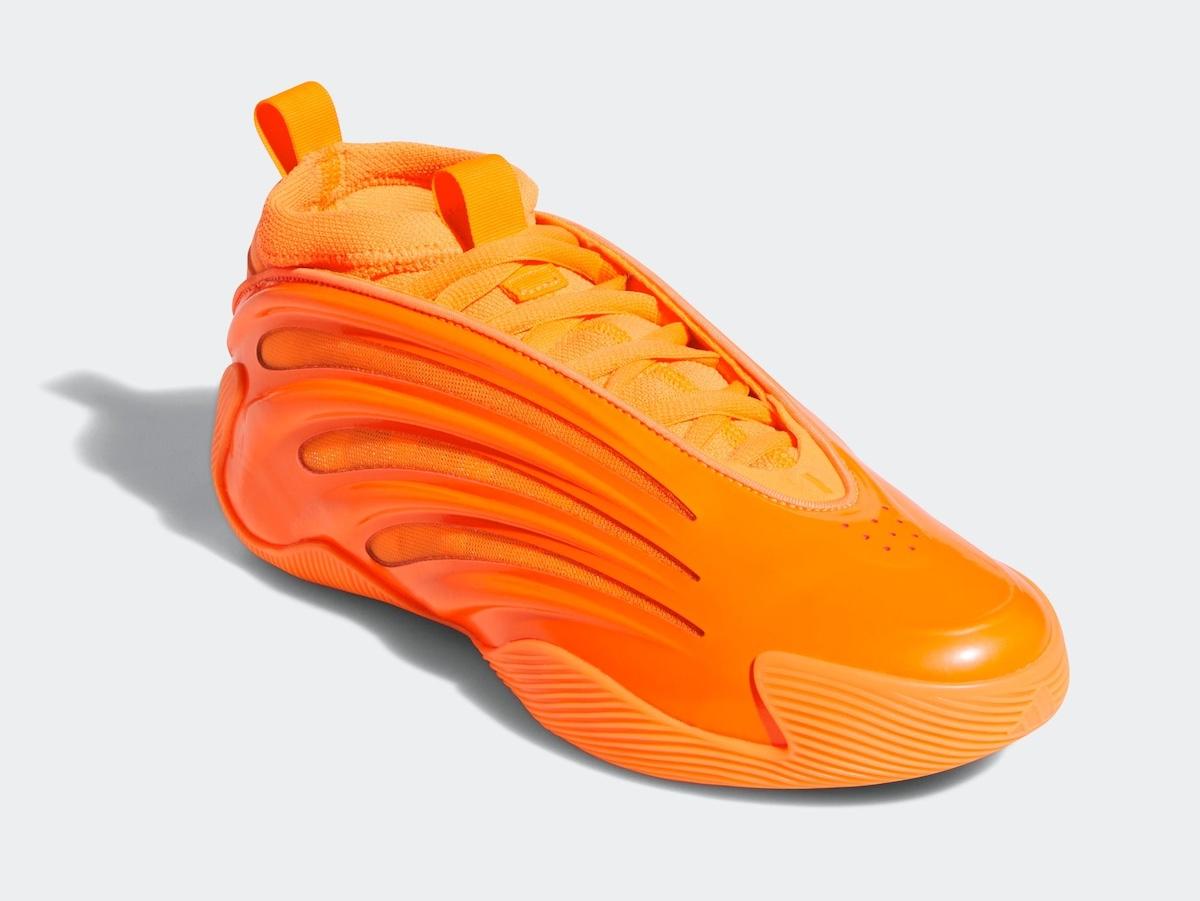 adidas Harden Vol. 9 'Dynamo Solar Orange' basketball shoe featuring a bold, sculpted design with glossy TPU overlays and a bright orange mesh upper. adidas Harden Vol. 9 'Dynamo Solar Orange' basketball shoe featuring a bold, sculpted design with glossy TPU overlays and a bright orange mesh upper.