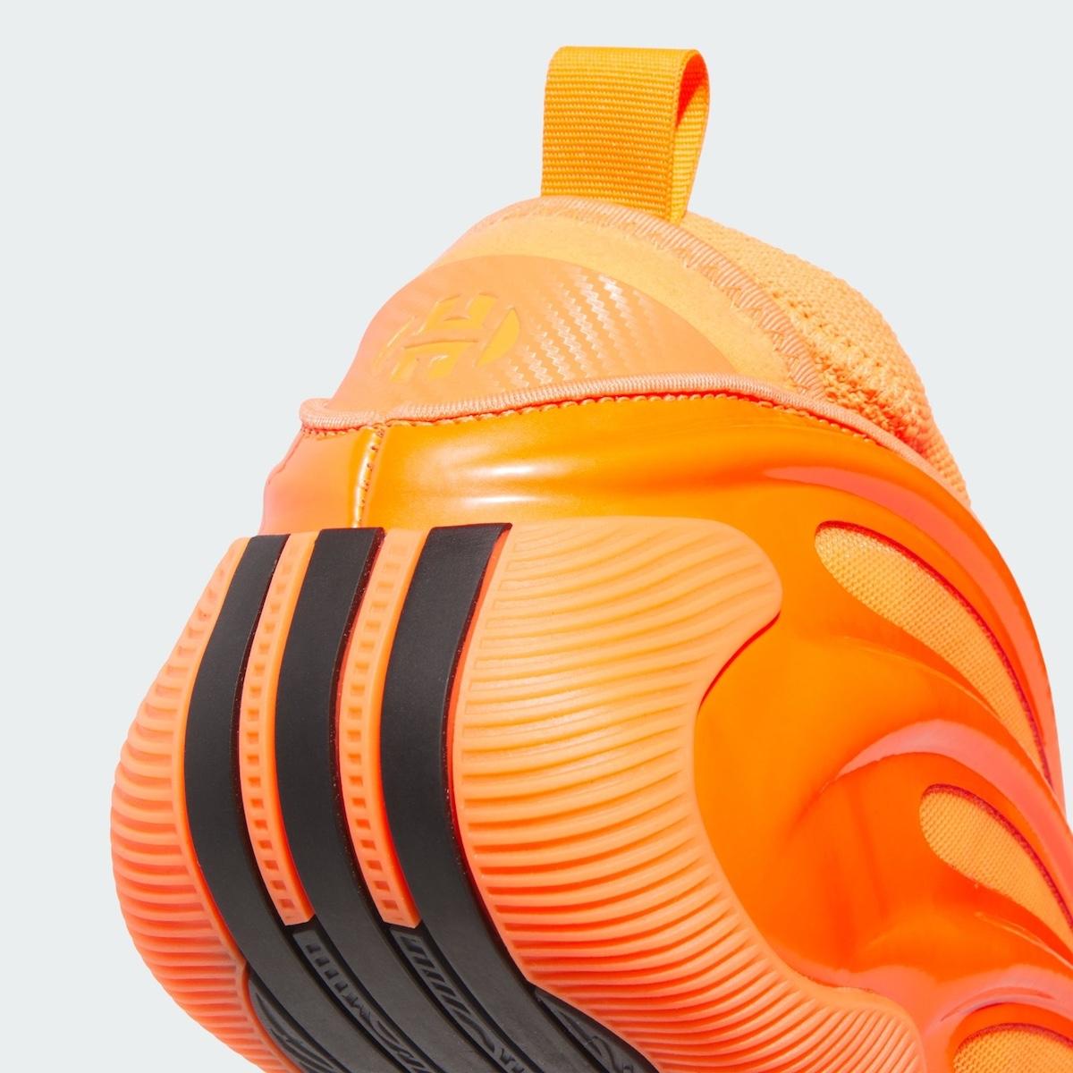 adidas Harden Vol. 9 'Dynamo Solar Orange' basketball shoe featuring a bold, sculpted design with glossy TPU overlays and a bright orange mesh upper. adidas Harden Vol. 9 'Dynamo Solar Orange' basketball shoe featuring a bold, sculpted design with glossy TPU overlays and a bright orange mesh upper.