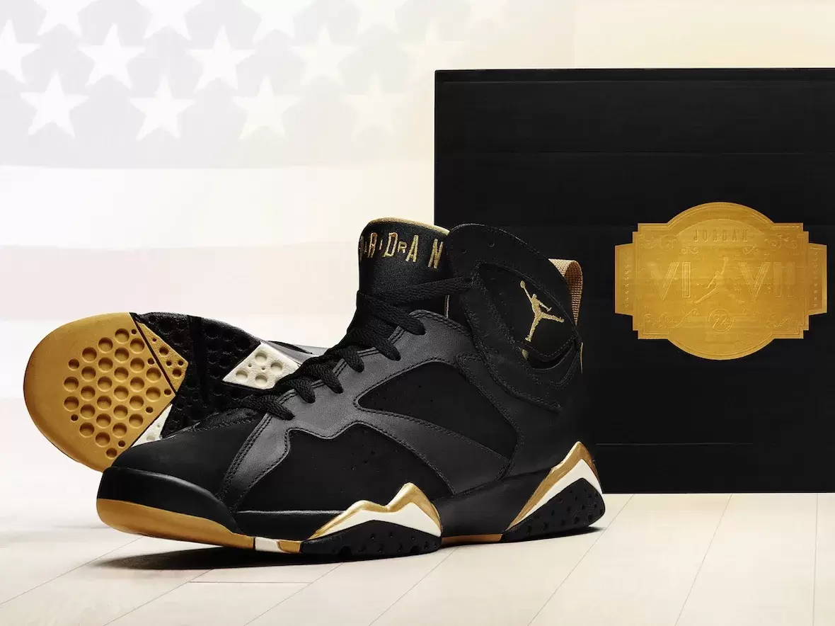 Air Jordan 7 Golden Moments black and gold sneaker with premium packaging and Olympic-inspired detailing Air Jordan 7 Golden Moments black and gold sneaker with premium packaging and Olympic-inspired detailing
