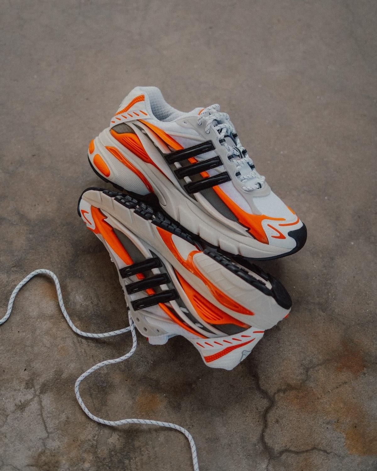 Pharrell x adidas Adistar Jellyfish Virginia Sneaker Close-Up – A detailed look at the Pharrell Williams x adidas Adistar Jellyfish in a white, black, and orange colorway, featuring bold overlays and futuristic design elements. Pharrell x adidas Adistar Jellyfish Virginia Sneaker Close-Up – A detailed look at the Pharrell Williams x adidas Adistar Jellyfish in a white, black, and orange colorway, featuring bold overlays and futuristic design elements.